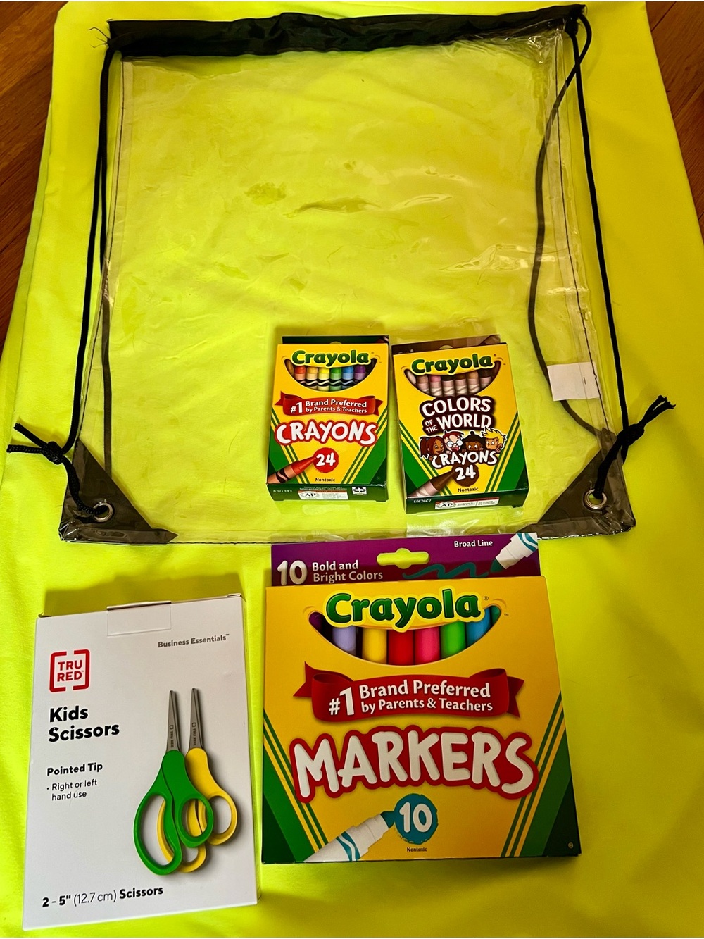 5 Pieces school supplies set. Crayons, markers, scissors Clear Drawstring Bag